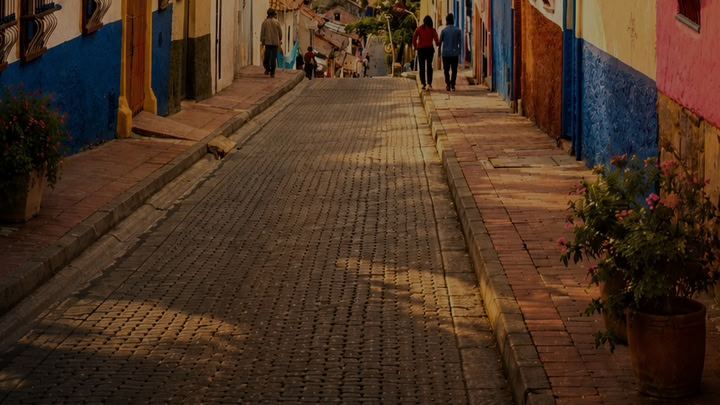 Cobbled colonial street below the mountains, Bogotá